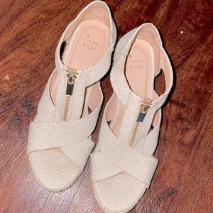 Never worn wedges. Perfect flecks of gold.